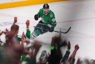 Fans and Dallas Stars' Mikko Rantanen, celebrate after Rantanen scored an emtpy-net goal...
