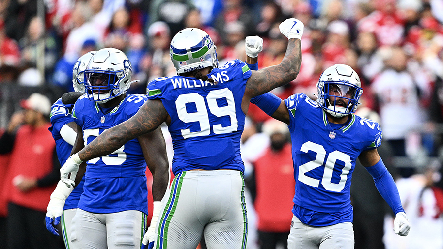 Seattle Seahawks Leonard Williams Julian Love celebrate 2024...