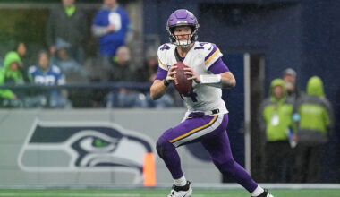 Seattle Seahawks Sam Darnold rolling out Minnesota Vikings 2024...