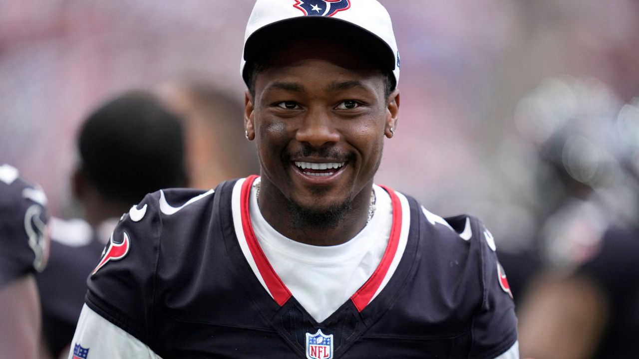 Houston Texans wide receiver Stefon Diggs walks along the sideline watchig play against the New York Giants in the second half of a preseason NFL football game, Saturday, Aug. 17, 2024, in Houston. (AP Photo/Eric Christian Smith)