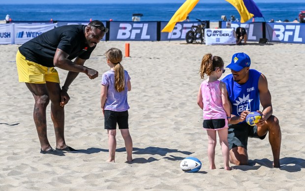 Super Bowl champion Malik Jackson (left) and Los Angeles Rams...