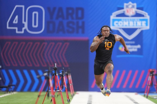 Central Florida running back RJ Harvey runs the 40-yard dash at the NFL football scouting combine in Indianapolis, Saturday, March 1, 2025. (AP Photo/Michael Conroy)