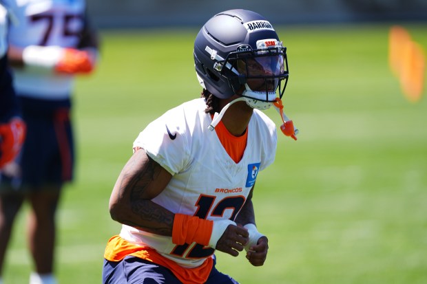 Denver Broncos cornerback Jahdae Barron takes part in drills during the NFL football team's rookie minicamp at the Broncos' headquarters Saturday, May 10, 2025, in Centennial, Colo. (AP Photo/David Zalubowski)