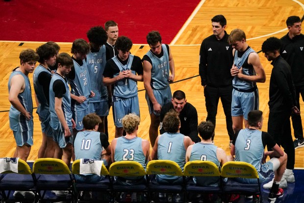 AURORA, CO - MARCH 26: Valor Christian Head Coach Keith Wahl greets his players as they head off the field to the bench at Regis Jesuit High School on March 26, 2022 in Aurora, Colorado. (Photo By Kathryn Scott/Special to The Denver Post)