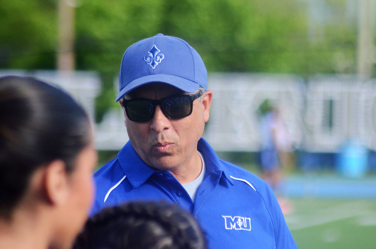 Marymount coach Michael Rivera stands on the sideline of the Atlantic East Championship for women’s flag football on Saturday, April 26, 2025, in Arlington, Va.