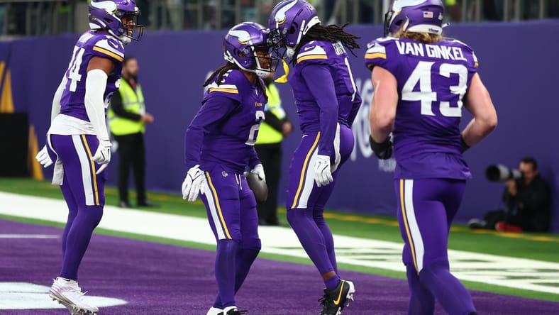 Stephon Gilmore celebrates an interception with Shaquill Griffin during a Vikings game in London against the Jets.