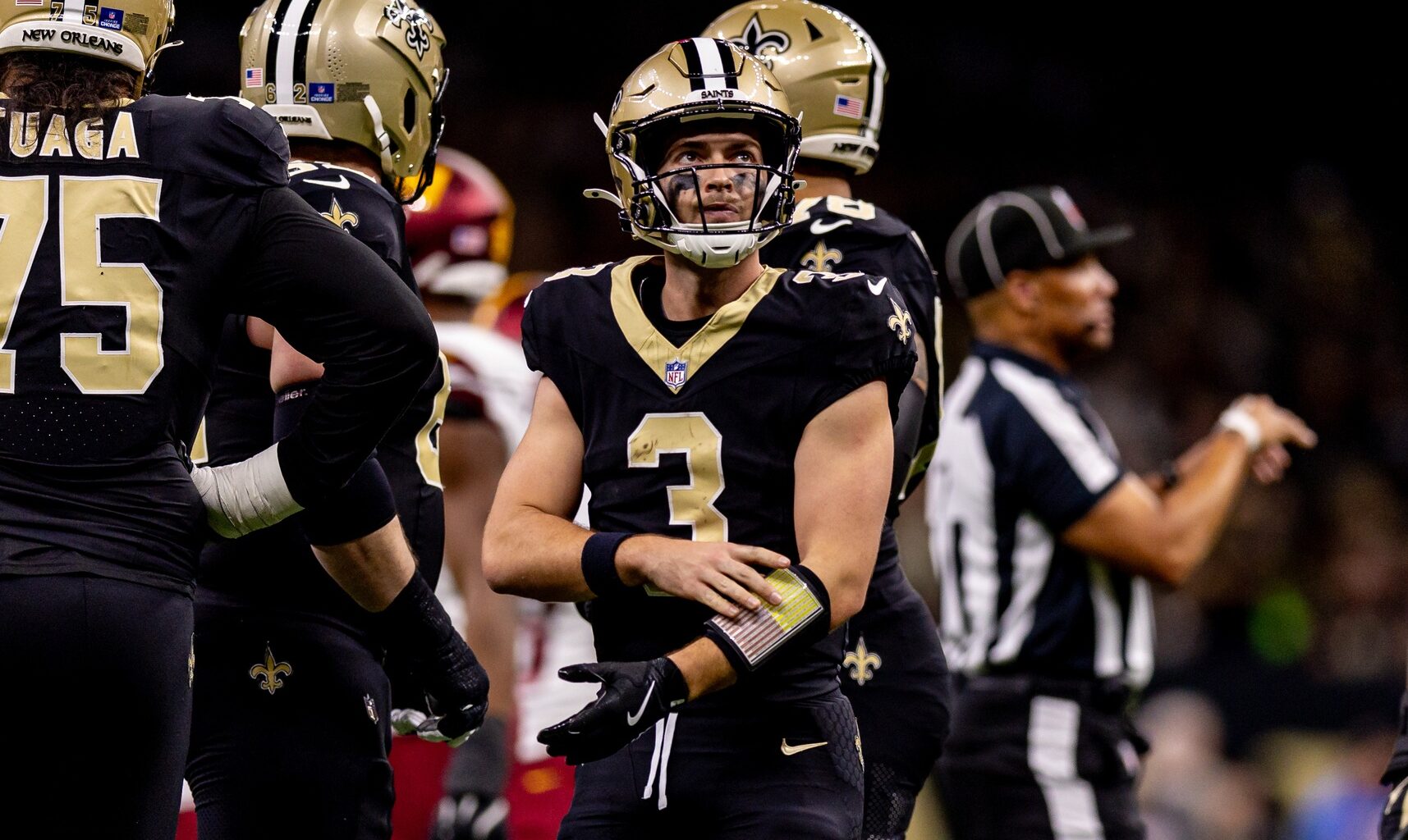 New Orleans Saints quarterback Jake Haener (3) looks on against the Washington Commanders during the first half at Caesars Superdome.