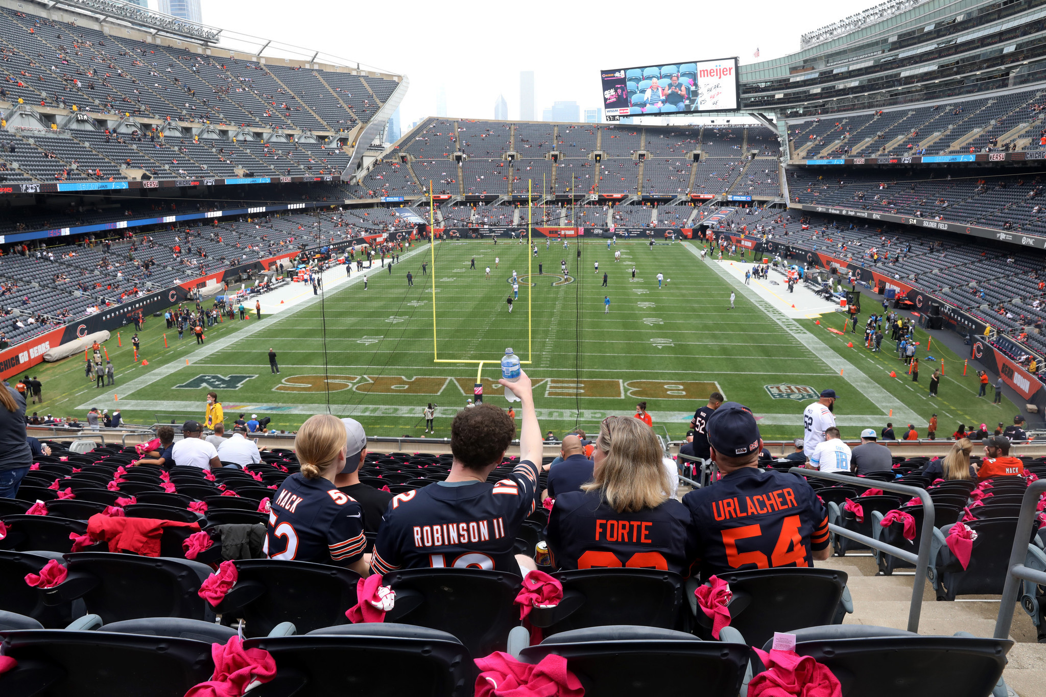 Fans settle into their seats prior to the start of a game between the Bears and Lions at Soldier Field on Oct. 3, 2021.