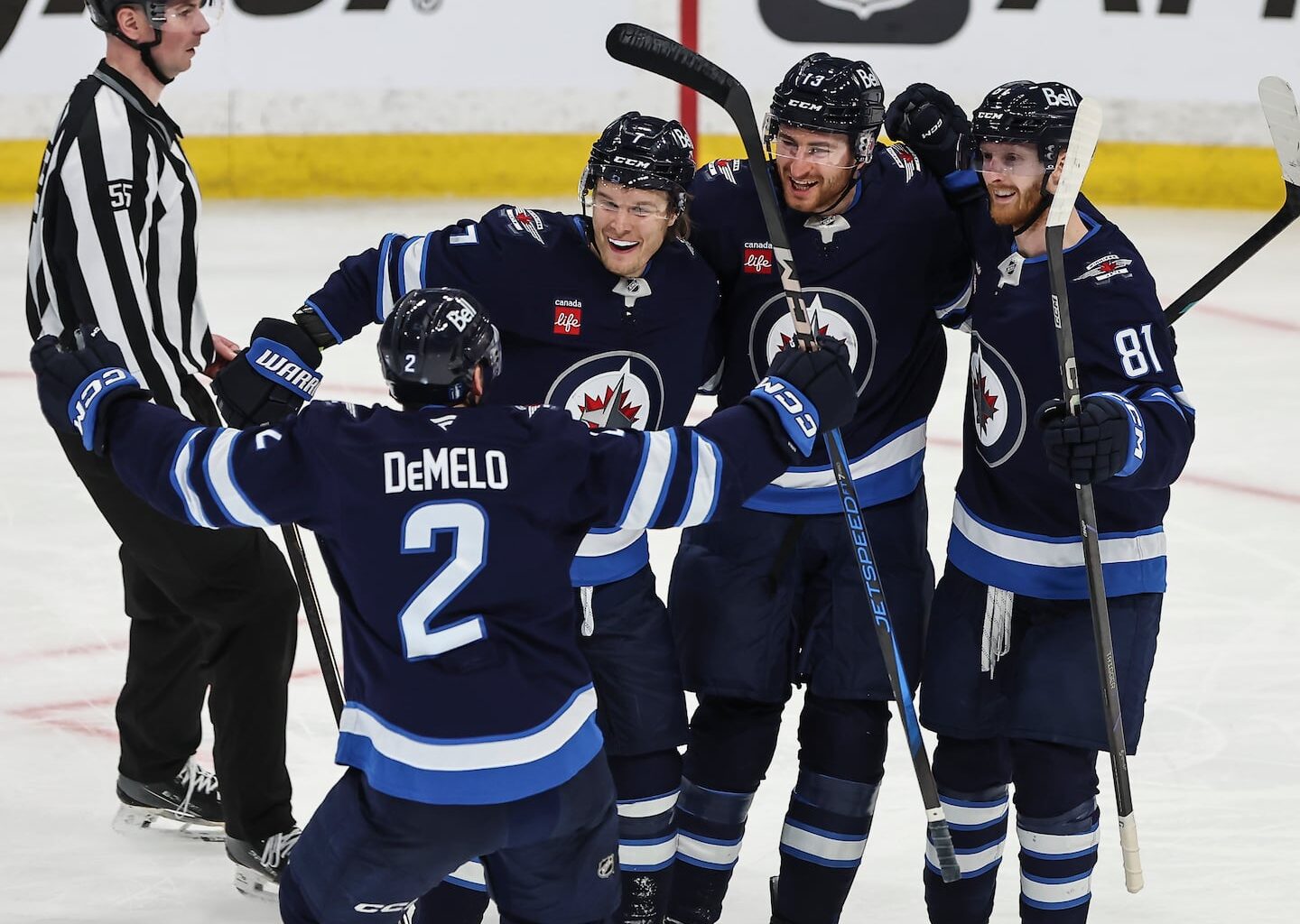 The Jets' Dylan DeMelo (2) is congratulated by teammates (from left) Vladislav Namestnikov, Gabriel Vilardi, and Kyle Connor after giving Winnipeg the lead midway through the second period.