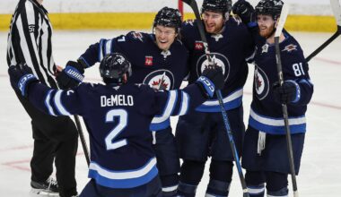 The Jets' Dylan DeMelo (2) is congratulated by teammates (from left) Vladislav Namestnikov, Gabriel Vilardi, and Kyle Connor after giving Winnipeg the lead midway through the second period.