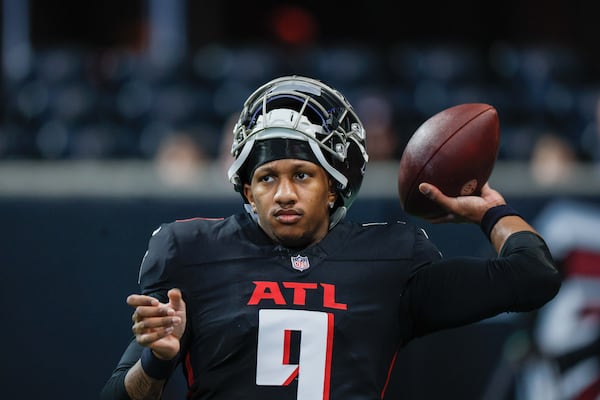 Falcons quarterback Michael Penix Jr. warms up before the team's season finale against the Panthers.