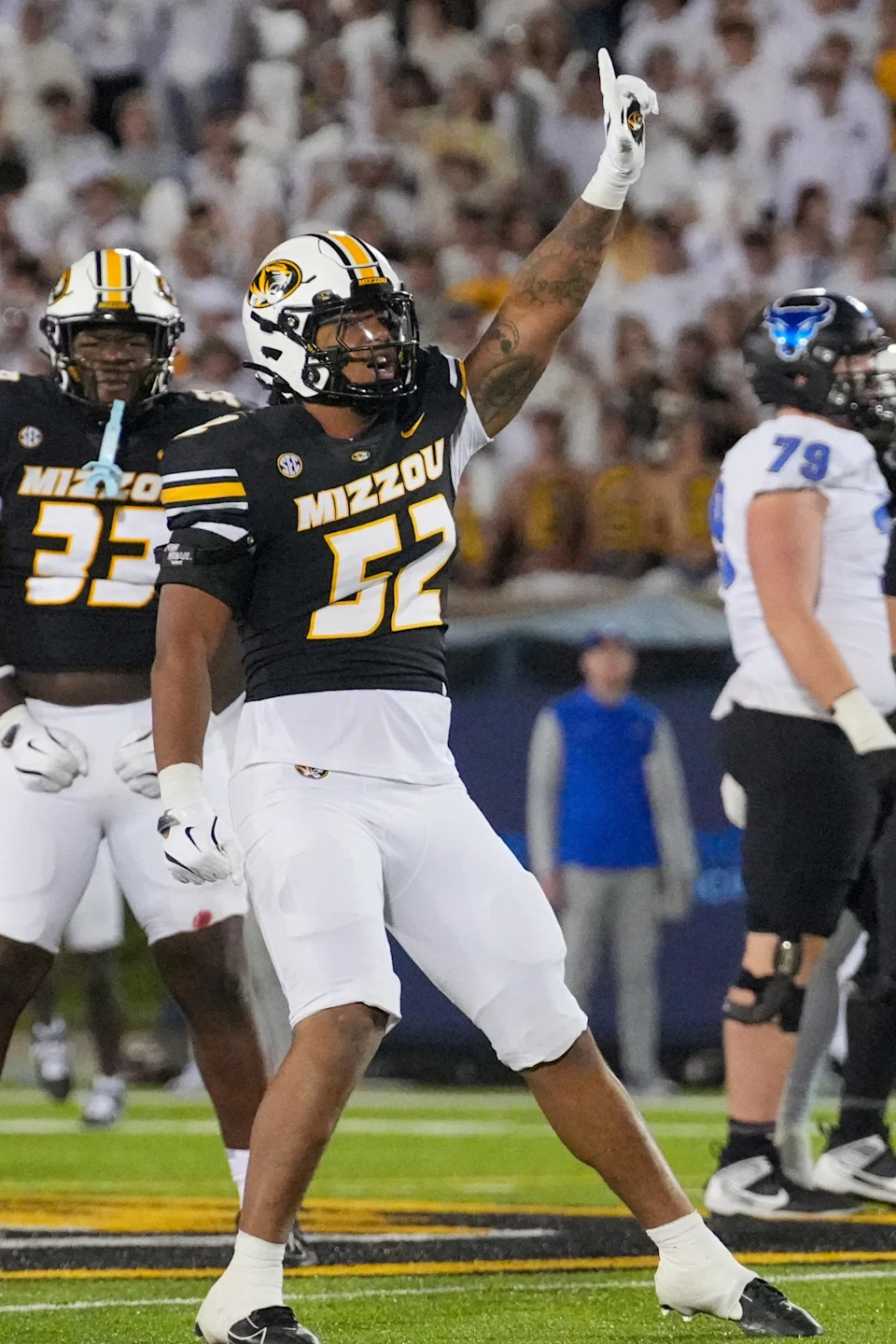 Sep 7, 2024; Columbia, Missouri, USA; Missouri Tigers defensive end Jahkai Lang (52) celebrates after sacking Buffalo Bulls quarterback C.J. Ogbonna (7) (not pictured during the second half at Faurot Field at Memorial Stadium.