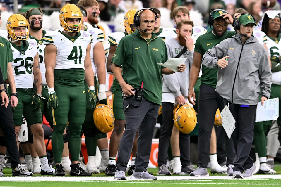 Dec 31, 2024; Houston, TX, USA; Baylor Bears head coach Dave Aranda looks on during the first half against the LSU Tigers at NRG Stadium. Mandatory Credit: Maria Lysaker-Imagn Images