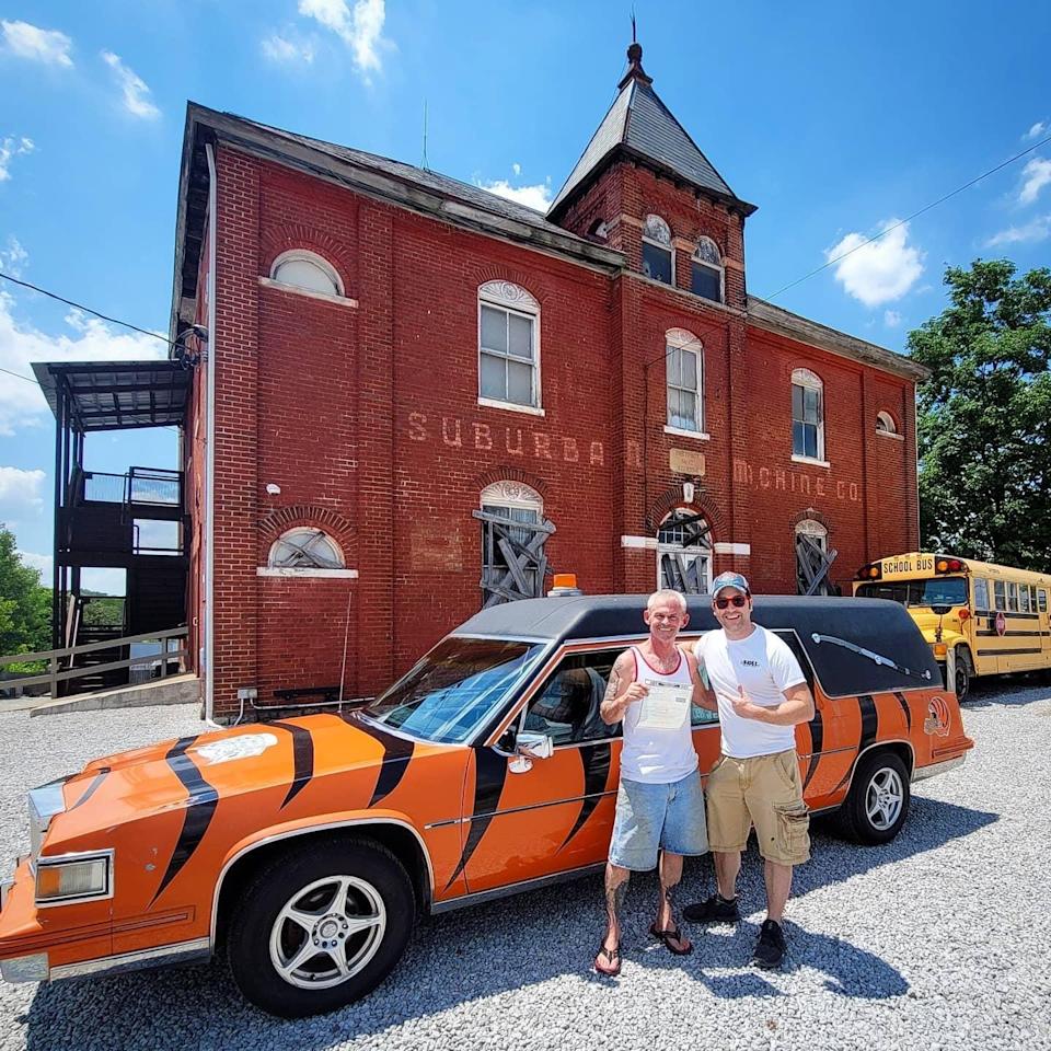 Brian Robertson with Bud Stross the day he purchased the Bengals-themed hearse.