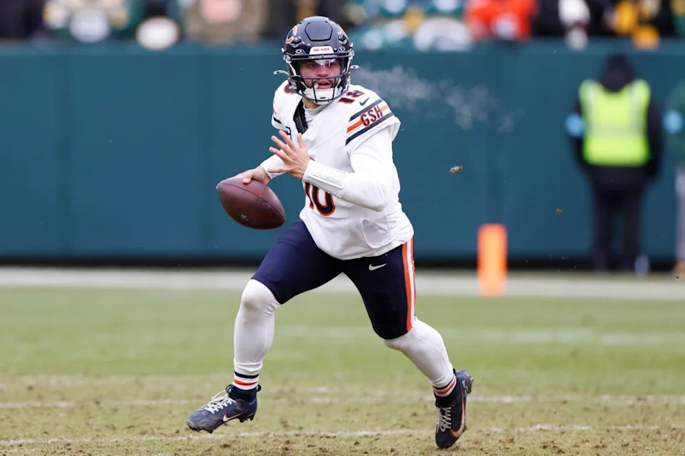 Caleb Williams #18 of the Chicago Bears runs with the ball in the second quarter against the Green Bay Packers at Lambeau Field on January 5, 2025 in Green Bay, Wisconsin. Getty Images