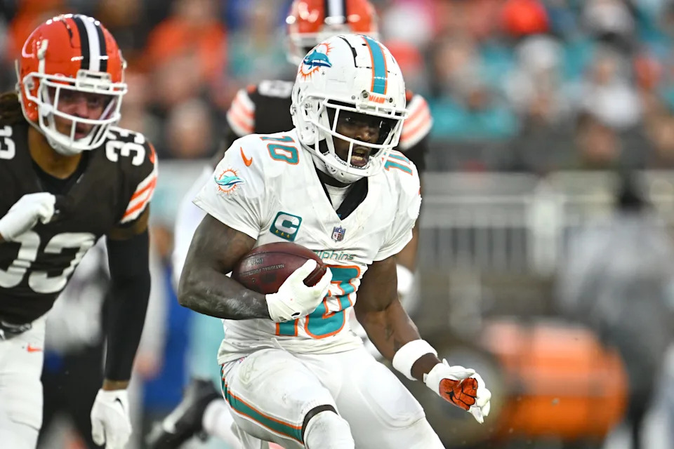 CLEVELAND, OHIO - DECEMBER 29: Tyreek Hill #10 of the Miami Dolphins runs the ball after a catch during the second quarter against the Cleveland Browns at Huntington Bank Field on December 29, 2024 in Cleveland, Ohio. (Photo by Jason Miller/Getty Images)
