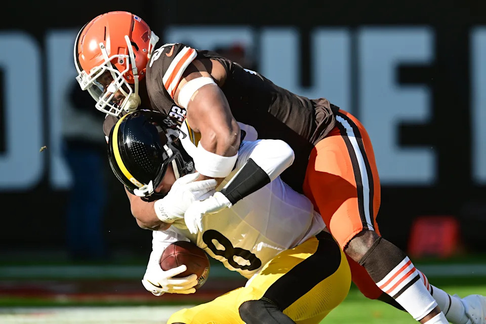 Nov 19, 2023; Cleveland, Ohio, USA; Cleveland Browns defensive end Myles Garrett (95) sacks Pittsburgh Steelers quarterback Kenny Pickett (8) during the first quarter at Cleveland Browns Stadium. Mandatory Credit: Ken Blaze-USA TODAY Sports