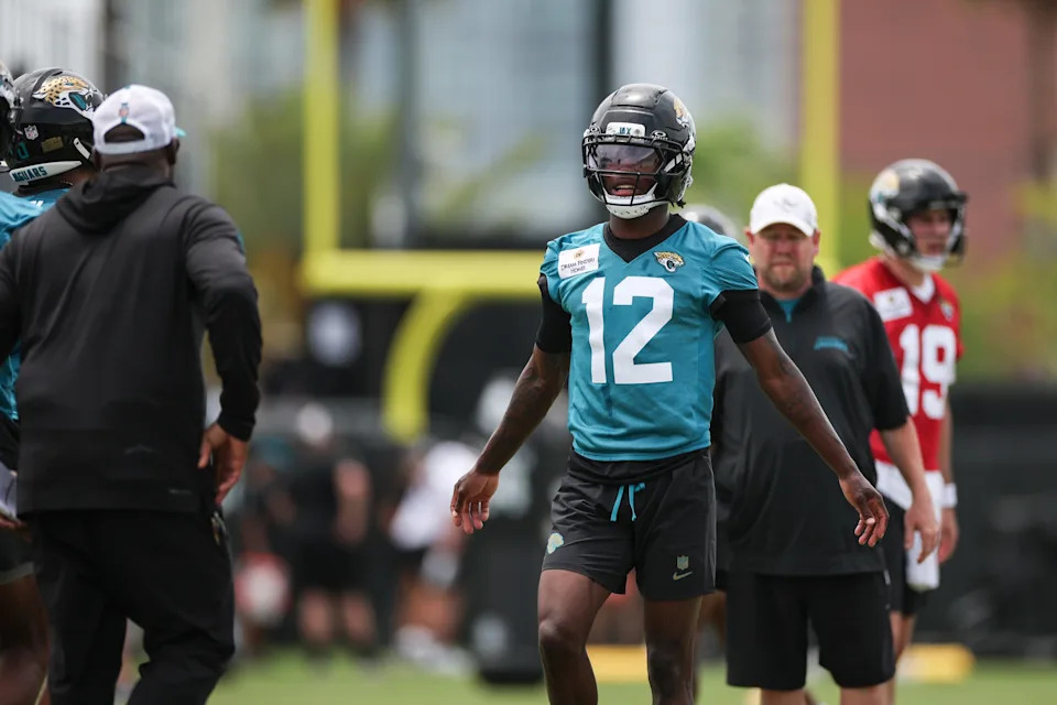 JACKSONVILLE, FLORIDA - MAY 10: Travis Hunter #12 of the Jacksonville Jaguars looks on during Jacksonville Jaguars Rookie Minicamp at Miller Electric Center on May 10, 2025 in Jacksonville, Florida. (Photo by James Gilbert/Getty Images)