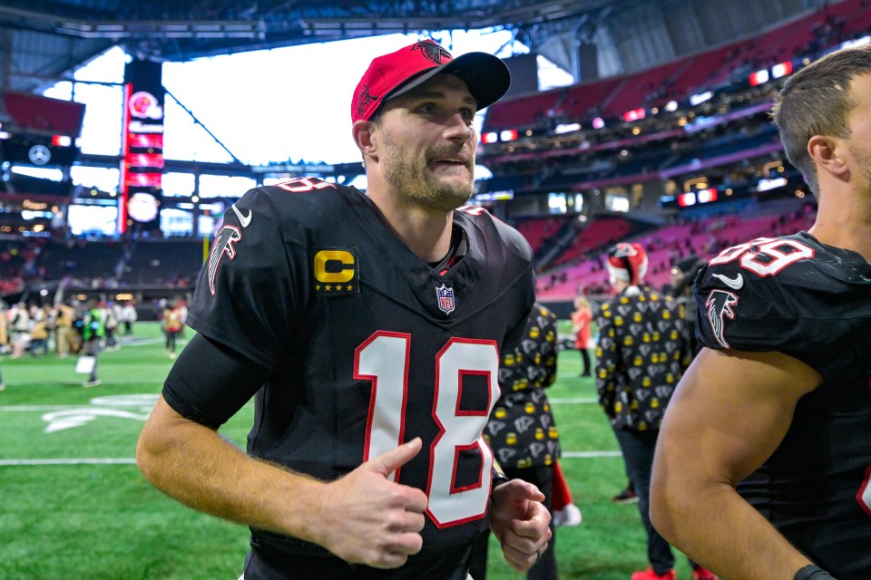 Kirk Cousins, Atlanta Falcons quarterback #18, gives a thumbs up.