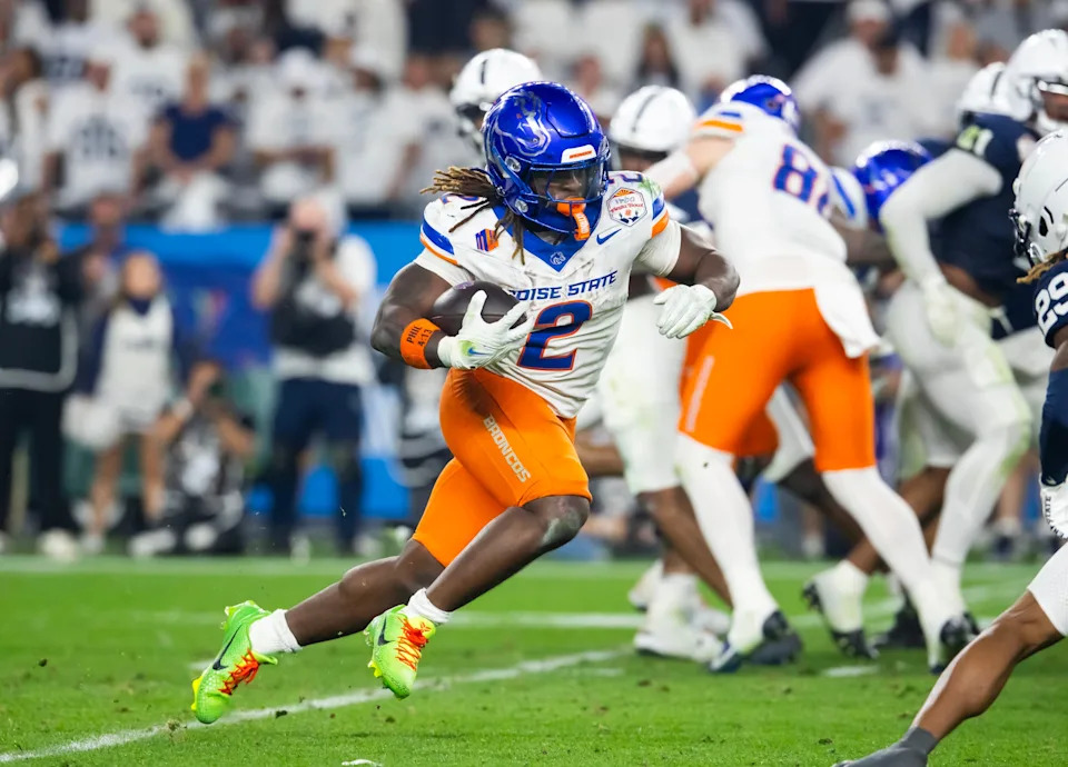 Dec 31, 2024; Glendale, AZ, USA; Boise State Broncos running back Ashton Jeanty (2) against the Penn State Nittany Lions during the Fiesta Bowl at State Farm Stadium. Mandatory Credit: Mark J. Rebilas-Imagn Images