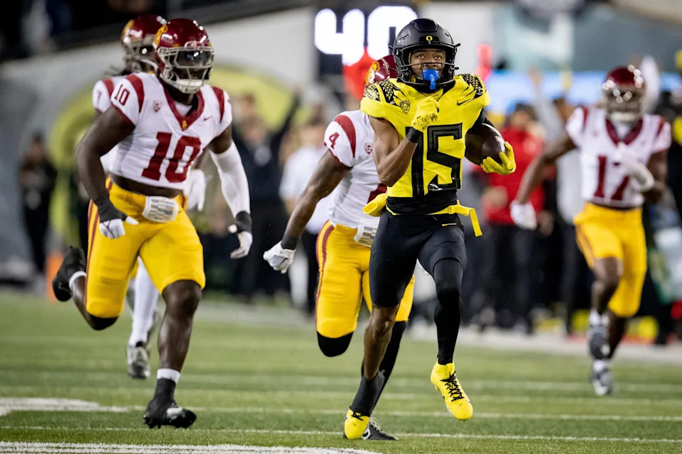 Oregon wide receiver Tez Johnson returns a pass for a touchdown as the No. 6 Oregon Ducks host the USC Trojans Saturday, Nov. 11, 2023, at Autzen Stadium in Eugene, Ore.