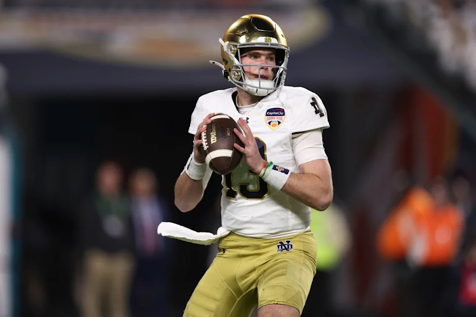 Notre Dame Fighting Irish quarterback Riley Leonard drops back.Nathan Ray Seebeck-Imagn Images