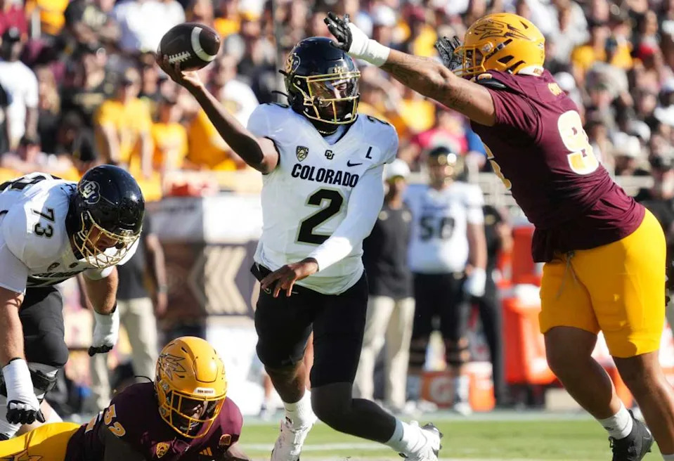 ASU Sun Devils defensive lineman Anthonie Cooper (96) tries to block the pass of Colorado Buffaloes quarterback Shedeur Sanders (2) at Mountain America Stadium on Oct 7, 2023Joe Rondone/The Republic / USA TODAY NETWORK via Imagn Images