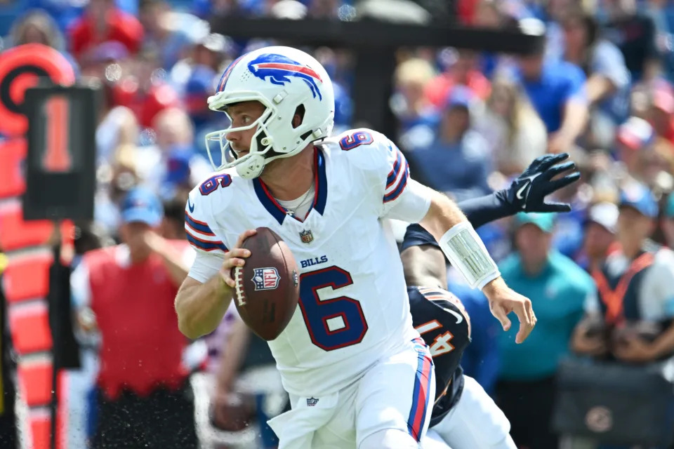 Aug 10, 2024; Orchard Park, New York, USA; Buffalo Bills quarterback Shane Buechele (6) rolls out of the pocket in the third quarter of a pre-season game against the Chicago Bears at Highmark Stadium. Mandatory Credit: Mark Konezny-USA TODAY Sports