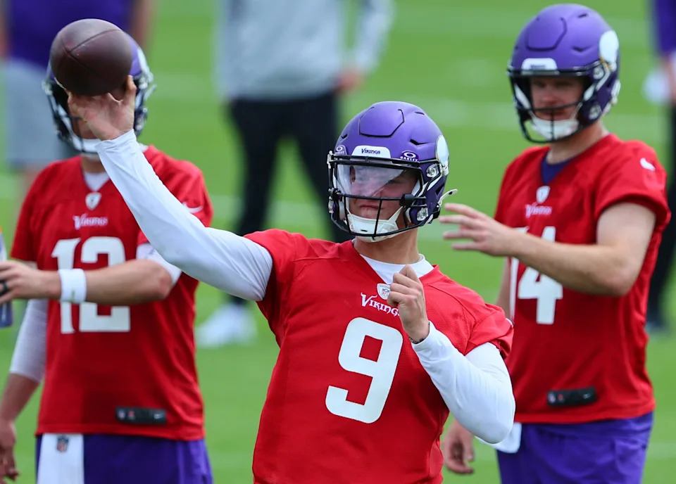 EAGAN, MINNESOTA - JUNE 04: Quarterbacks J.J. McCarthy #9, Sam Darnold #14 and Nick Mullens #12 of the Minnesota Vikings watch the drill during Minnesota Vikings mandatory minicamp at Twin Cities Orthopedics Performance Center on June 04, 2024 in Eagan, Minnesota.(Photo by Adam Bettcher/Getty Images)