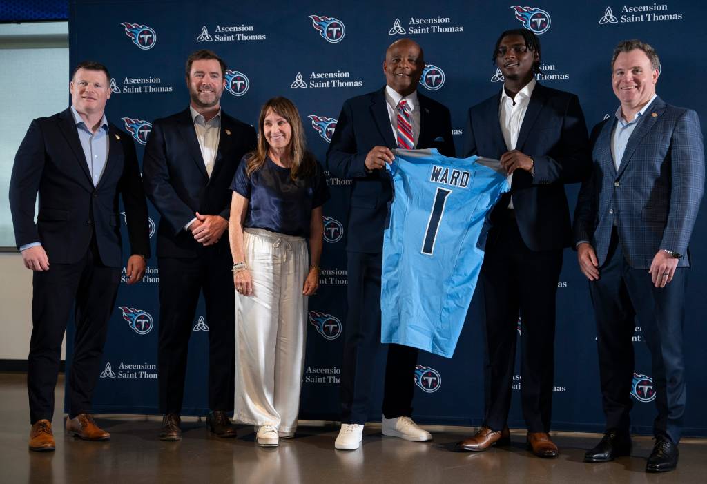 From right: Titans GM Mike Borgonzi, QB Cam Ward, Warren Moon, Amy Adams Strunk, head coach Brian Callahan and president of football operations Chad Brinker.