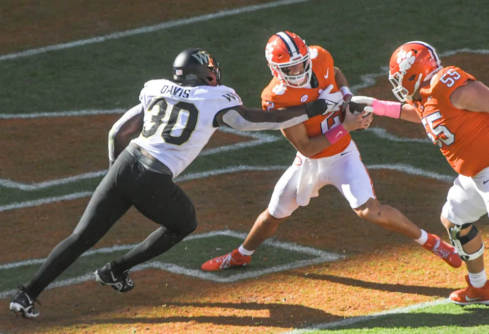 Clemson quarterback Cade Klubnik (2) is pressured by Wake Forest defensive lineman Jasheen Davis (30). Mandatory Credit: Ken Ruinard-Imagn Images