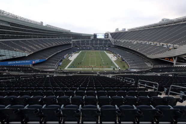 Players begin to warm up before a game between the...