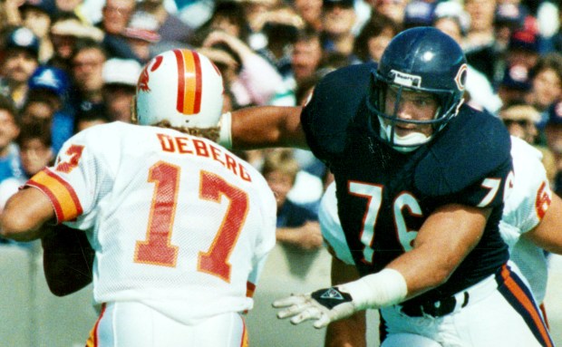 The Bucs' Steve DeBerg looks for a receiver, but all...