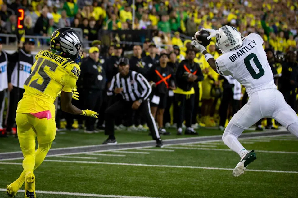 Michigan State Spartans defensive back Charles Brantley intercepts a pass intended for Oregon Ducks wide receiver Tez Johnson as the Ducks host the Spartans Friday, Oct. 4, 2024 at Autzen Stadium in Eugene, Ore.© Ben Lonergan&sol;The Register-Guard &sol; USA TODAY NETWORK via Imagn Images