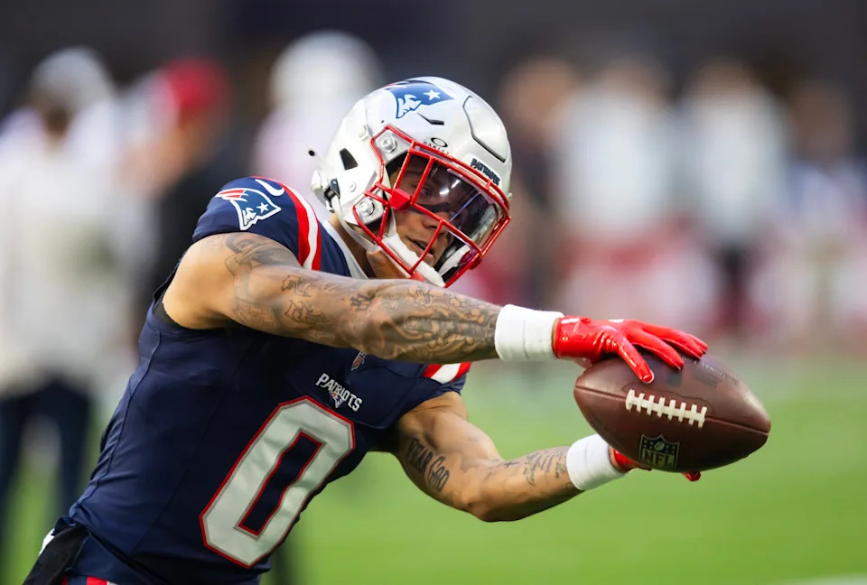 Dec 15, 2024; Glendale, Arizona, USA; New England Patriots cornerback Christian Gonzalez (0) against the Arizona Cardinals at State Farm Stadium. Mandatory Credit: Mark J. Rebilas-Imagn Images