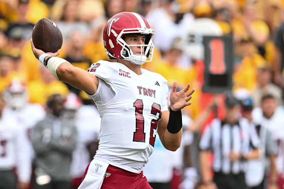 Troy quarterback Matthew Caldwell gets ready to throw a pass in a game against Iowa last season. Caldwell pledged to join Texas out of the portal Sunday, giving the Longhorns' quarterbacks room a veteran who will play in his fifth collegiate season this fall.