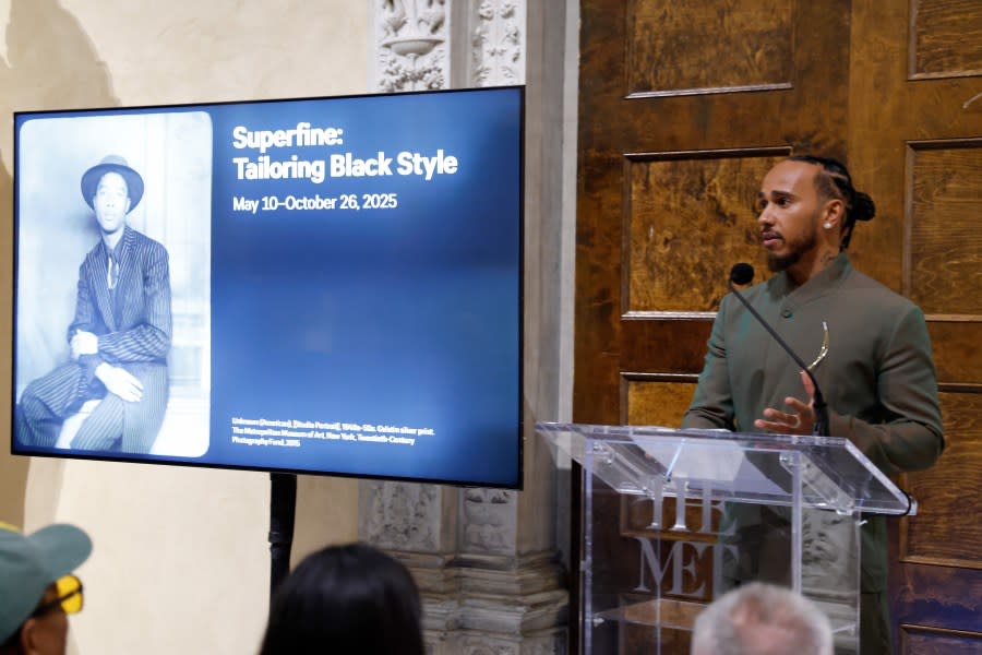 Lewis Hamilton speaks during a press conference announcing the Spring 2025 Costume Institute exhibition “Superfine: Tailoring Black Style” at Metropolitan Museum of Art on October 09, 2024 in New York City. (Photo by Taylor Hill/WireImage)