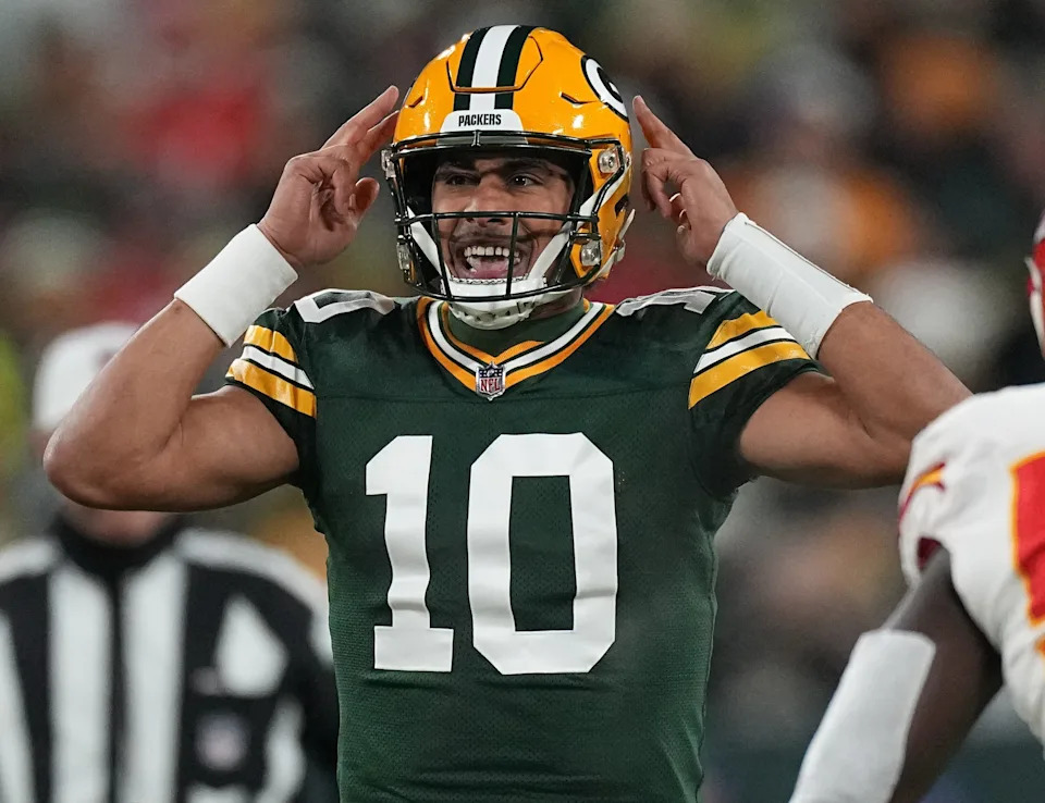 Green Bay Packers quarterback Jordan Love (10) makes an adjustment at the life during the first quarter of their game against the Kansas City Chiefs Sunday, December 3, 2023 at Lambeau Field in Green Bay, Wisconsin.