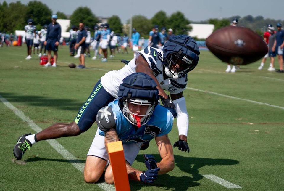 Seahawks cornerback Michael Jackson (30) knocks a pass away from Titans wide receiver Mason Kinsey (12) in the second joint practice between the NFL teams at Saint Thomas Sports Park in Nashville, Thursday, Aug. 15, 2024. Denny Simmons / The Tennessean via USA Today Network/USA TODAY NETWORK
