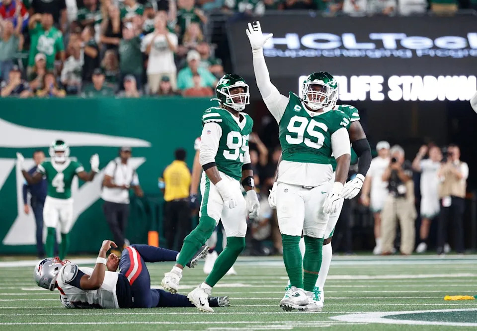 Quinnen Williams celebrates after he tackles Jacoby Brissett during the Jets’ home win over the Patriots last season.<br> Charles Wenzelberg/New York Post