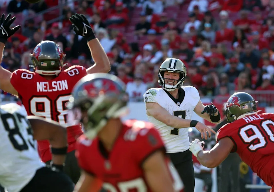 Dec 31, 2023; Tampa, Florida, USA; New Orleans Saints quarterback Taysom Hill (7) throws the ball against the Tampa Bay Buccaneers during the second half at Raymond James Stadium. Mandatory Credit: Kim Klement Neitzel-USA TODAY Sports