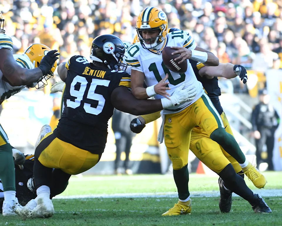 Nov 12, 2023; Pittsburgh, Pennsylvania, USA; Green Bay Packers quarterback Jordan Love (10) gets sacked by Pittsburgh Steelers linebacker T.J. Watt (90) as defensive tackle Keeanu Benton (95) gets a hand on him during the second quarter at Acrisure Stadium. Mandatory Credit: Philip G. Pavely-USA TODAY Sports