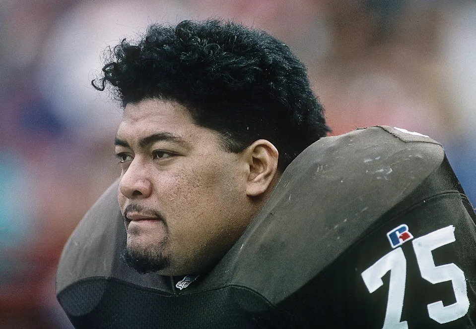 Dec 26, 1993; Anaheim, CA, USA; FILE PHOTO; Cleveland Browns defensive end Pio Sagapolutele (75) on the sideline against the Los Angeles Rams at Anaheim Stadium. Mandatory Credit: Peter Brouillet-USA TODAY NETWORK