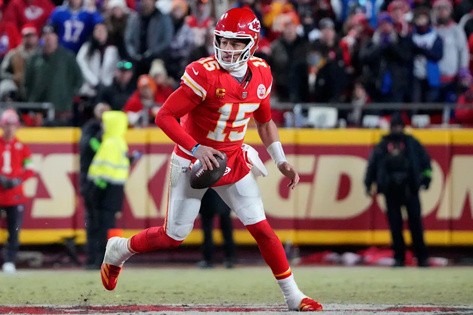 Kansas City Chiefs quarterback Patrick Mahomes (15) rushes the ball against the Buffalo Bills during the second half in the AFC Championship game at GEHA Field at Arrowhead Stadium in Kansas City on Jan. 26, 2025.