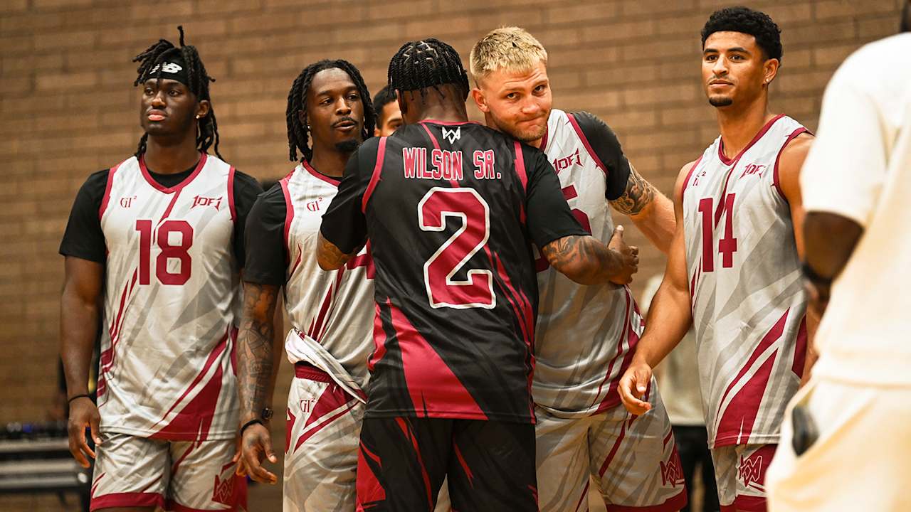 Cardinals LB Mack Wilson Sr. gets support from his Arizona teammates during his charity basketball game