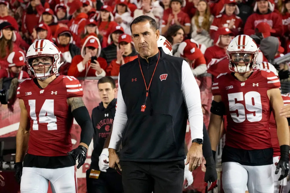 Nov 16, 2024; Madison, Wisconsin, USA; Wisconsin Badgers head coach Luke Fickell during warmups prior to the game against the Oregon Ducks at Camp Randall Stadium. Mandatory Credit: Jeff Hanisch-Imagn Images