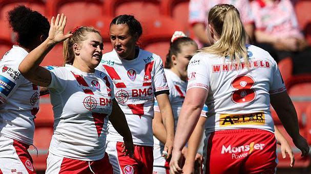 St Helens forward Shona Hoyle lifts an arm in celebration of her try against York Valkyrie in the Challenge Cup semi-final 