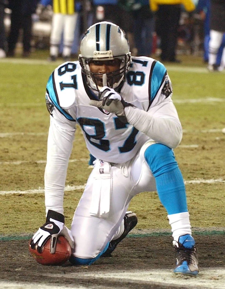Carolina wide receiver Muhsin Muhammad (87) gestures to quiet the crowd after scoring a second-quarter touchdown in the NFC Championship between the Carolina Panthers and Philadelphia Eagles played Sunday, January 18, 2004 at Lincoln Financial Field in Philadelphia.