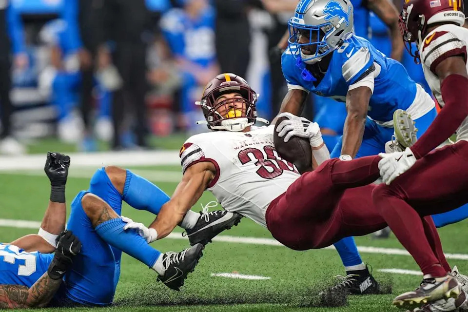 Terrion Arnold (right) makes a tackle against Austin Ekeler this past winter. © Kimberly P. Mitchell / USA TODAY NETWORK via Imagn Images