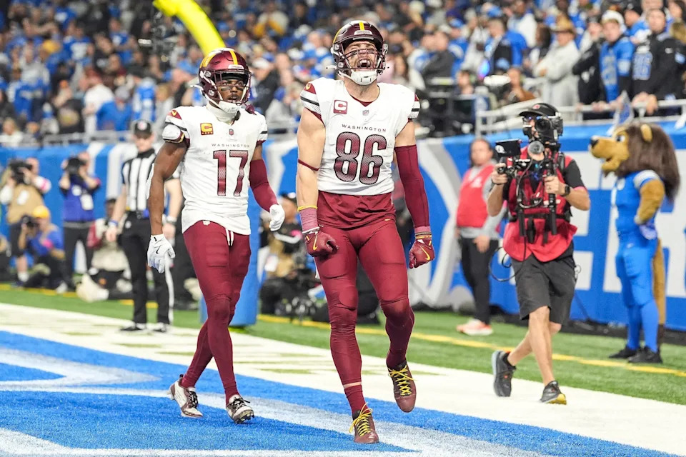 Washington Commanders tight end Zach Ertz (86) celebrates a touchdown against Detroit Lions during the first half of the NFC divisional round at Ford Field in Detroit on Saturday, Jan. 18, 2025.